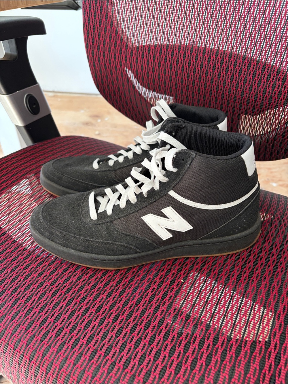 New Balance Black and White High-Top Sneakers